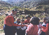 Snapshot of Herman shaking hands with the local kids.